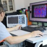 Production team assembling lithium golf cart and motive power packs with LiFePO4 cells - saftecenergy